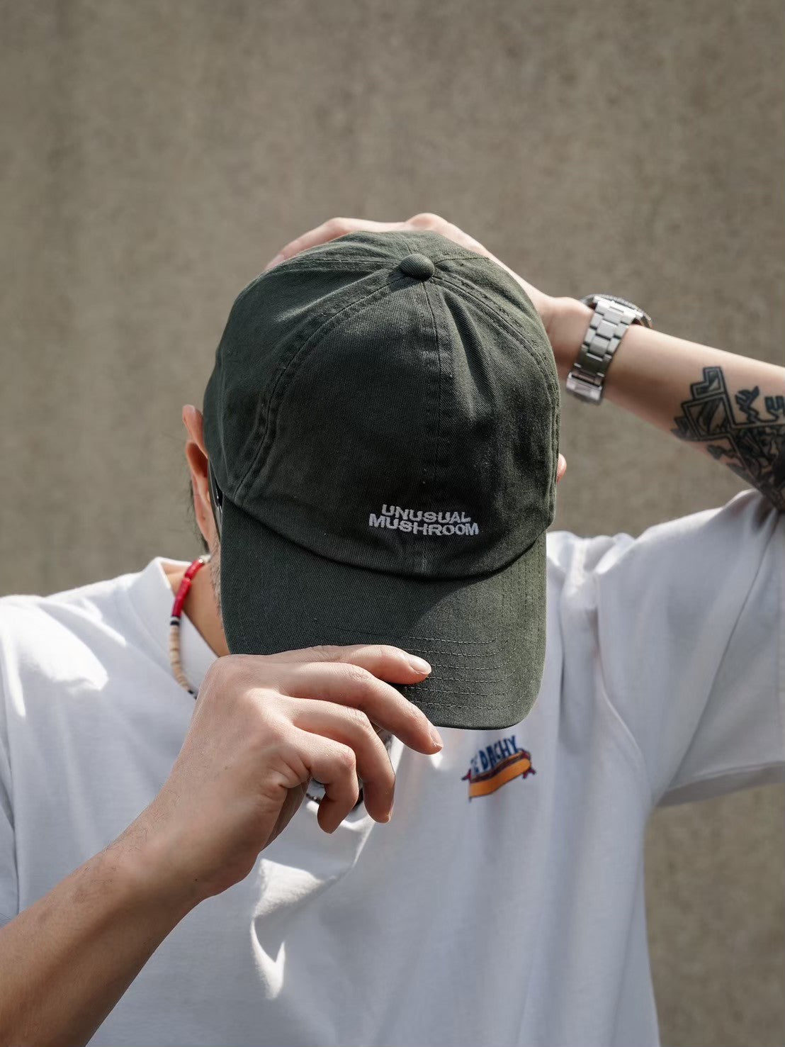 UNUSUAL CAP