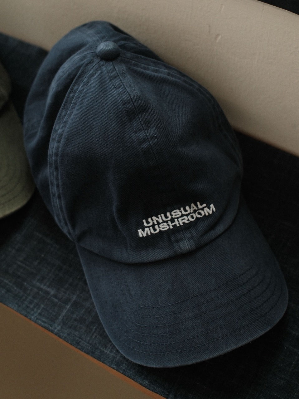 UNUSUAL CAP